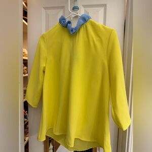 Tuckernuck Pomander Place Sunny Yellow Top with blue ruffle neck and tie